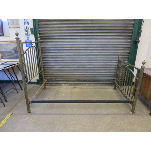 814 - A vintage brass single bed with head and foot boards having urn finial decoration.