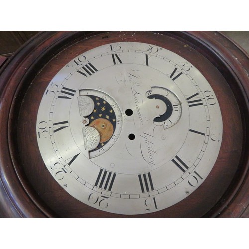 816 - An antique mahogany wall bracket clock with inlaid decoration and a circular dial and moon roller to... 