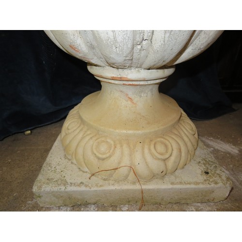 3 - A large weathered vintage garden urn with 2 handles and relief fawn decoration on pedestal base appr... 