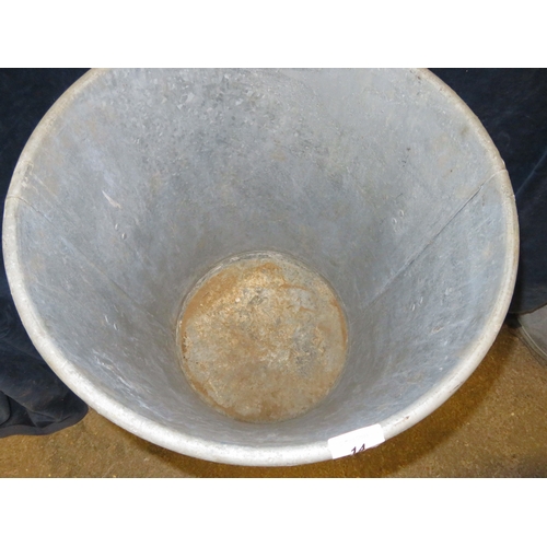 14 - A galvanized two-handled bin with sloping sides. Top diameter approx 45cm and approx 60cm tall.