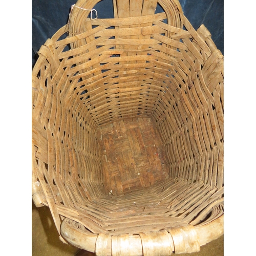 17 - A large vintage woven log basket.