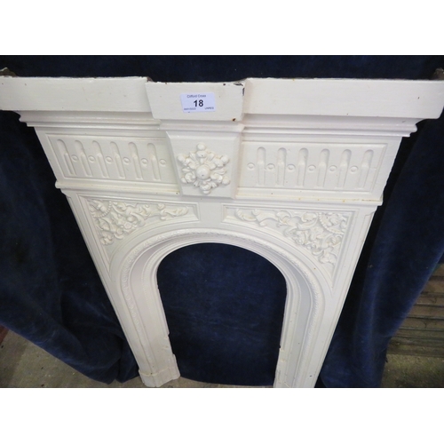18 - A cast iron fire surround having classical decoration 53cm wide at top and 91cm tall. Opening is app... 