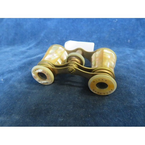 46 - A pair of opera glasses with Mother-of-Pearl decoration by Marchand, Paris.