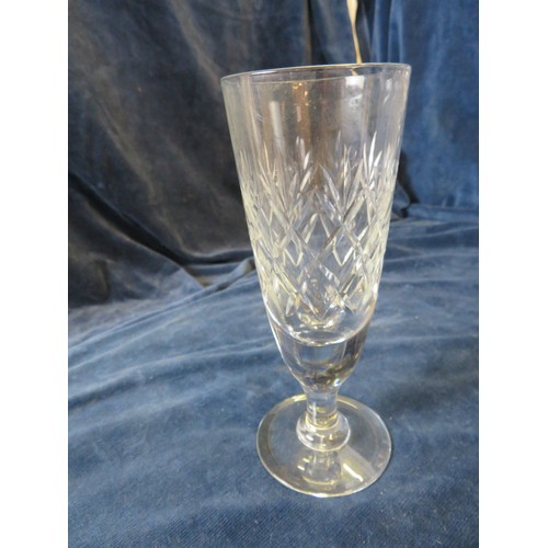 311 - Six cut glass champagne flutes, together with 4 hock glasses.