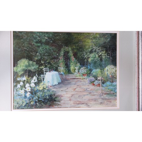 50 - A framed oil on canvas depicting garden scene by P. Newton.