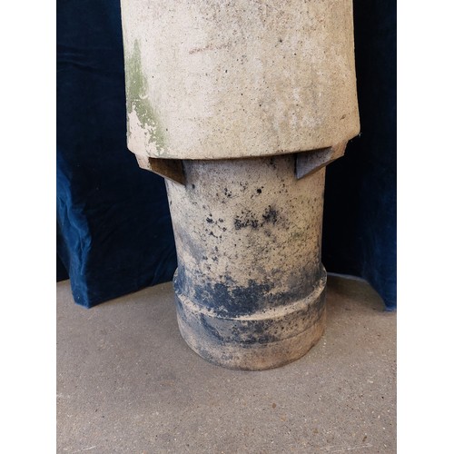 5 - A terracotta tapered chimney pot.