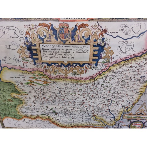 24 - A framed coloured print being Saxton's map of Suffolk, 1575.