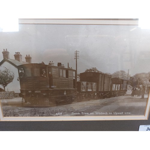 38 - A framed black and white print of a photograph taken of Steam Tram on Wisbech to Upwell Line.