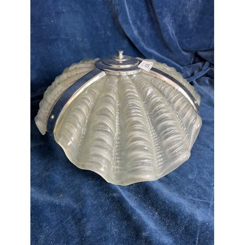 636 - An Art Deco glass and chrome light shade having shell design. Approximately 33 - 34cm diameter x 15c... 