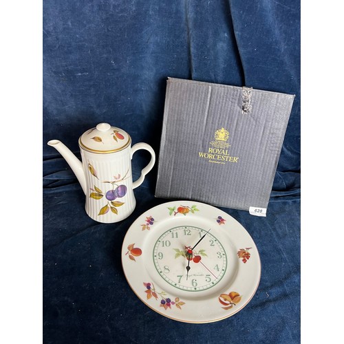 628 - A boxed Royal Worcester wall clock, together with a Royal Worcester coffee pot.