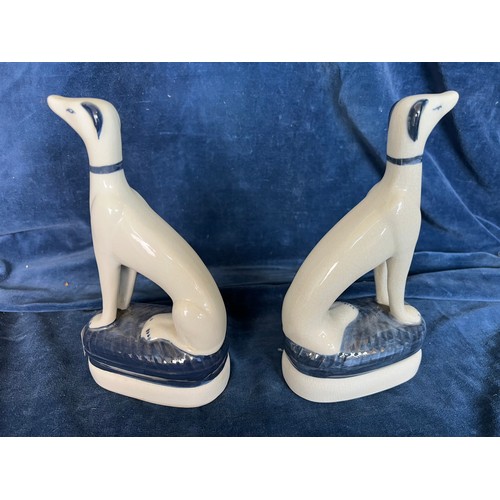 617 - A pair of Ironstone China blue and white dog bookends (some crazing to glaze).