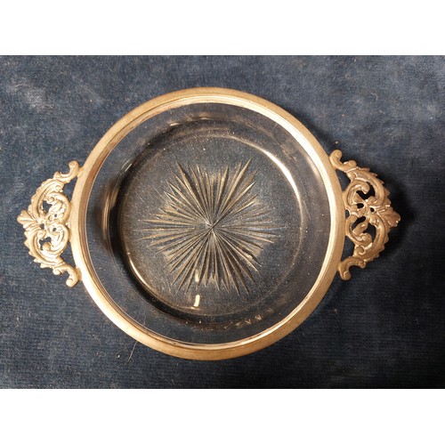 176 - A cut glass and silver wine taster/Quaich glass having starburst centre design, silver mount, hallma... 