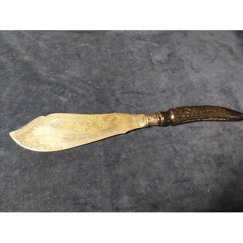 187 - A carving set having horn style handles, with silver banding hallmarked Sheffield, together with a t... 