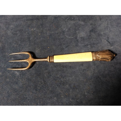 187 - A carving set having horn style handles, with silver banding hallmarked Sheffield, together with a t... 