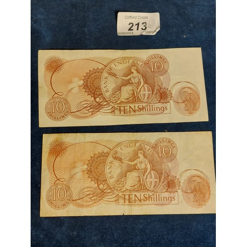 213 - Two 10 Shilling notes.