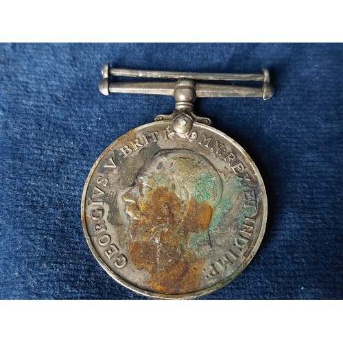 225 - A 1914 - 1918 George V war medal inscribed around the side 