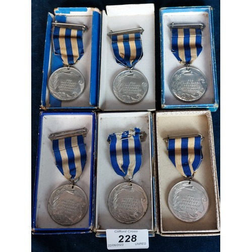 228 - Six Isle of Ely Education Committee medals and ribbons for 