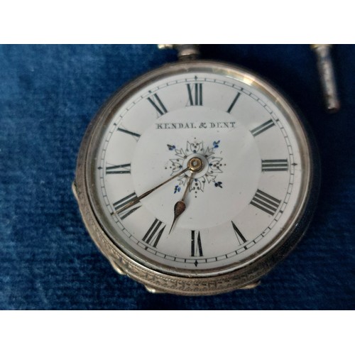 247 - A silver cased pocket watch having engine turned decoration and winder by Kendal & Kent, hallmarked ... 