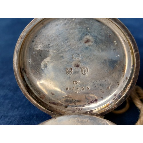 247 - A silver cased pocket watch having engine turned decoration and winder by Kendal & Kent, hallmarked ... 