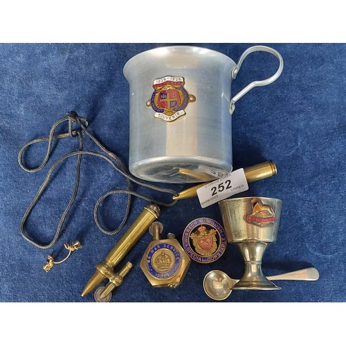 252 - A sundry lot comprising Trench Art lighter from the Norfolk Regiment, a Wisbech Borough Special Cons... 