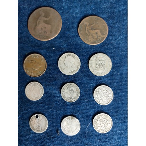 257 - A box containing early British coins comprising 1876 One Penny, 1885 Half Penny, 1939 Farthing, 1836... 