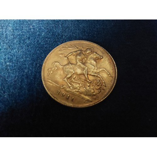 258 - A 1911 George V Gold half Sovereign.