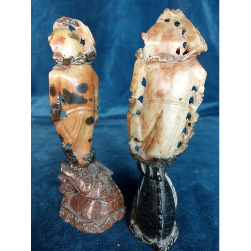 262 - Two carved Onyx figures on bases in the Oriental style.