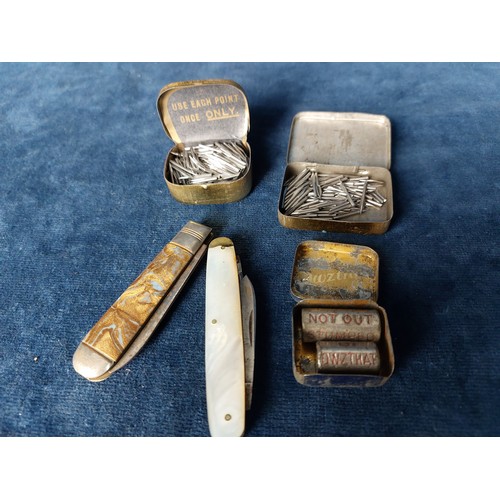 263 - A sundry lot comprising 2 lighters, a Mother-of-Pearl handled pen knife and 1 other, box of matches,... 