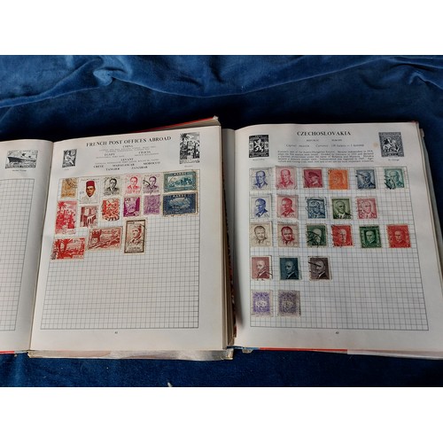 279 - Two Stanley Gibbons stamp albums containing stamps from around the world.