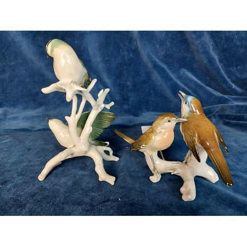 307 - Two German porcelain duo figures of birds designed by Karl Ens depicting a pair of singing birds, an... 