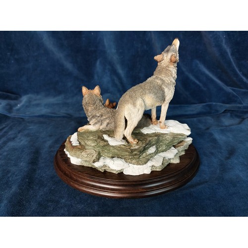 325 - A Country Artists figure 'Call of the Wild', CA584, on wooden base, being a limited edition, No 551 ... 