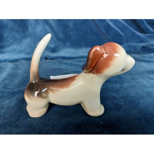 338 - A Beswick figurine of a comical Dashshund dog, number 1088 from the 'Fun Models Series'.