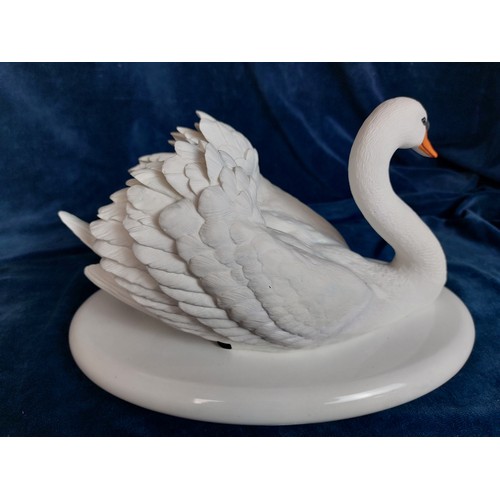 341 - A Franklin Mint figurine crafted in Bisque porcelain 'The Royal Swan' by Ronald Van Ruy C. Kevelt, o... 