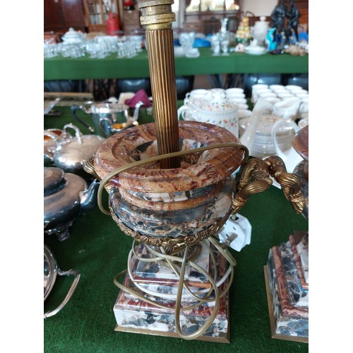 391 - A pair of antique onyx/blue marble urns on platform bases with gilt metal handles and pedestals havi... 