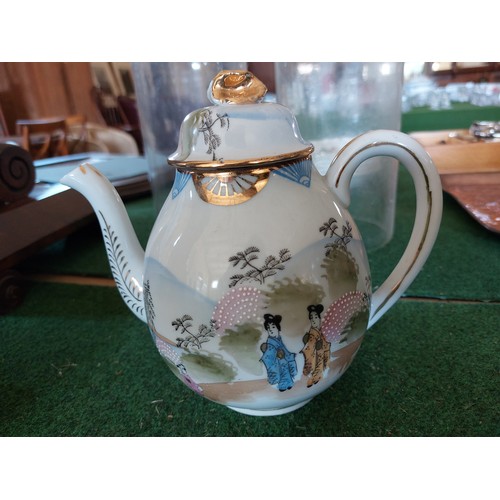 403 - An Oriental pattern coffee set comprising coffee pot, covered cream jug, covered 2-handled sugar pot... 