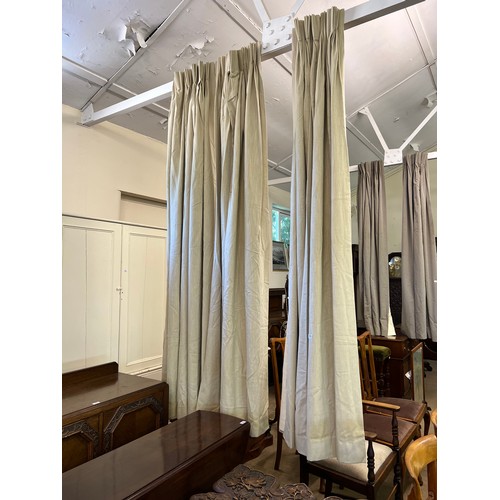 773 - Two pairs of beige-lined curtains.