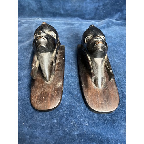 296 - A pair of Kamba Tribe Kenya carved wooden heads depicting tribal ladies with shaped backs with label... 