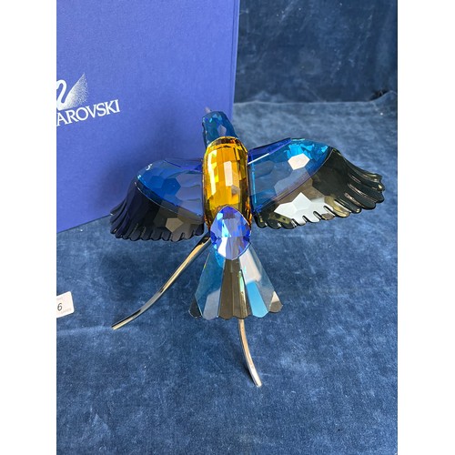 556 - A Swarovski Crystal figure being Paradise Birds, Roller Bird on chrome stand, with original box.