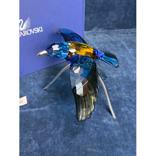 556 - A Swarovski Crystal figure being Paradise Birds, Roller Bird on chrome stand, with original box.