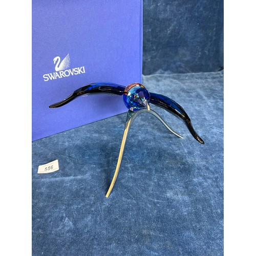 556 - A Swarovski Crystal figure being Paradise Birds, Roller Bird on chrome stand, with original box.