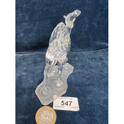 547 - A Swarovski Crystal figure of a Camel.