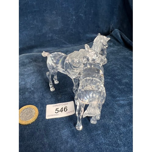 546 - A Swarovski Crystal figure of a pair of Foals.