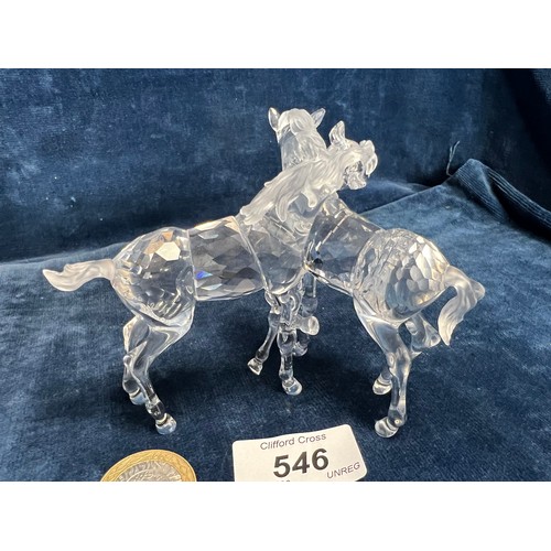 546 - A Swarovski Crystal figure of a pair of Foals.