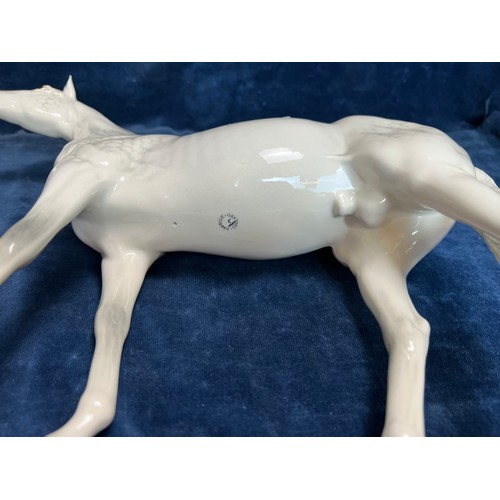 529 - A large Beswick figure of a Dapple-grey Stallion.