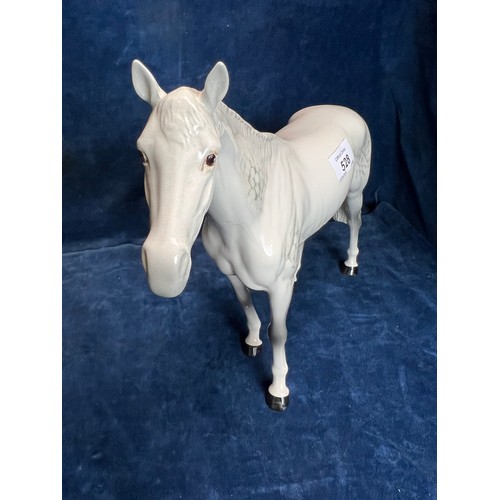 528 - A large Beswick figure of a Dapple-grey Stallion.