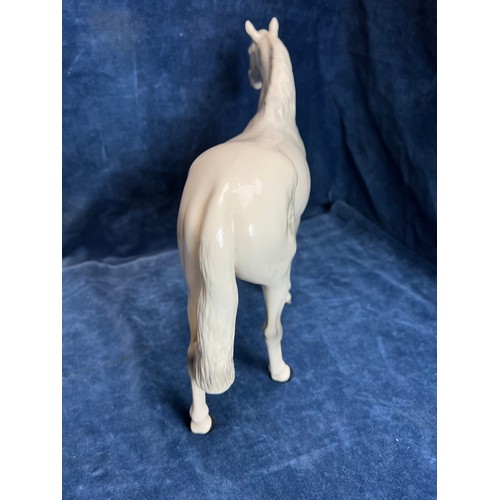 528 - A large Beswick figure of a Dapple-grey Stallion.