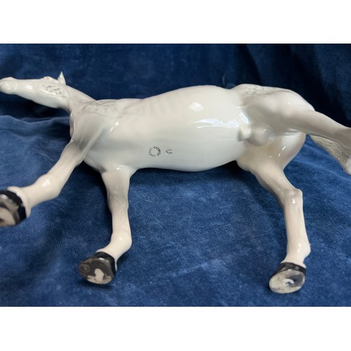 528 - A large Beswick figure of a Dapple-grey Stallion.