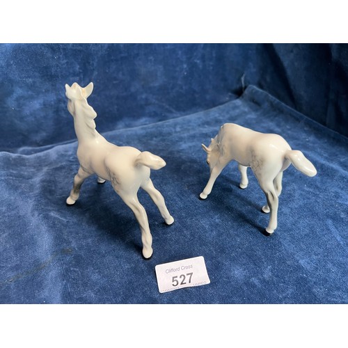 527 - Two small Beswick figures being Dapple-grey Foals.