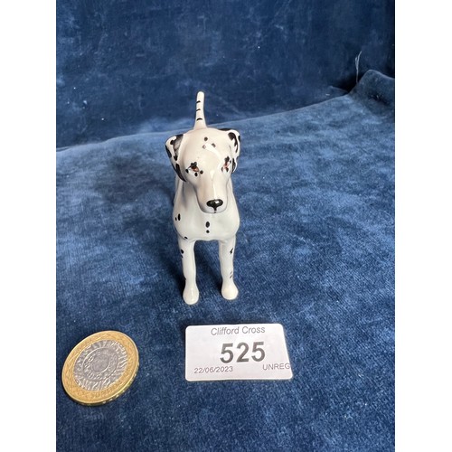 525 - A Beswick figure of a Dalmatian.