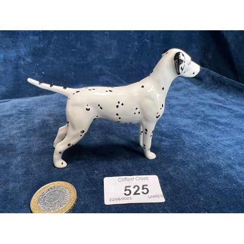 525 - A Beswick figure of a Dalmatian.